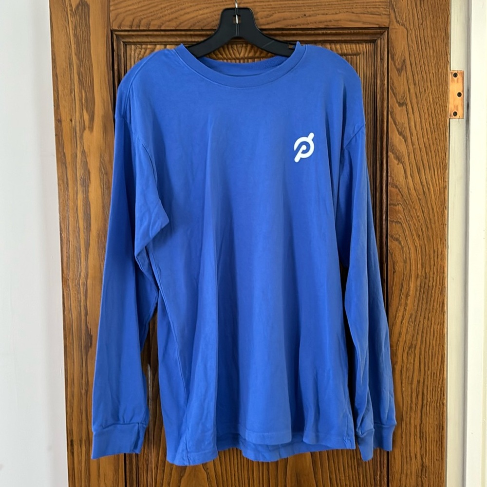 Men’s medium light blue peloton long sleeve shirt